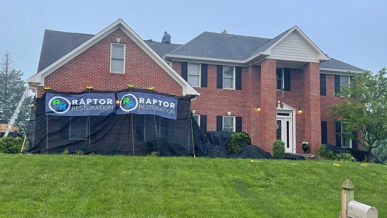 Raptor Roofing completed roof on a brick home